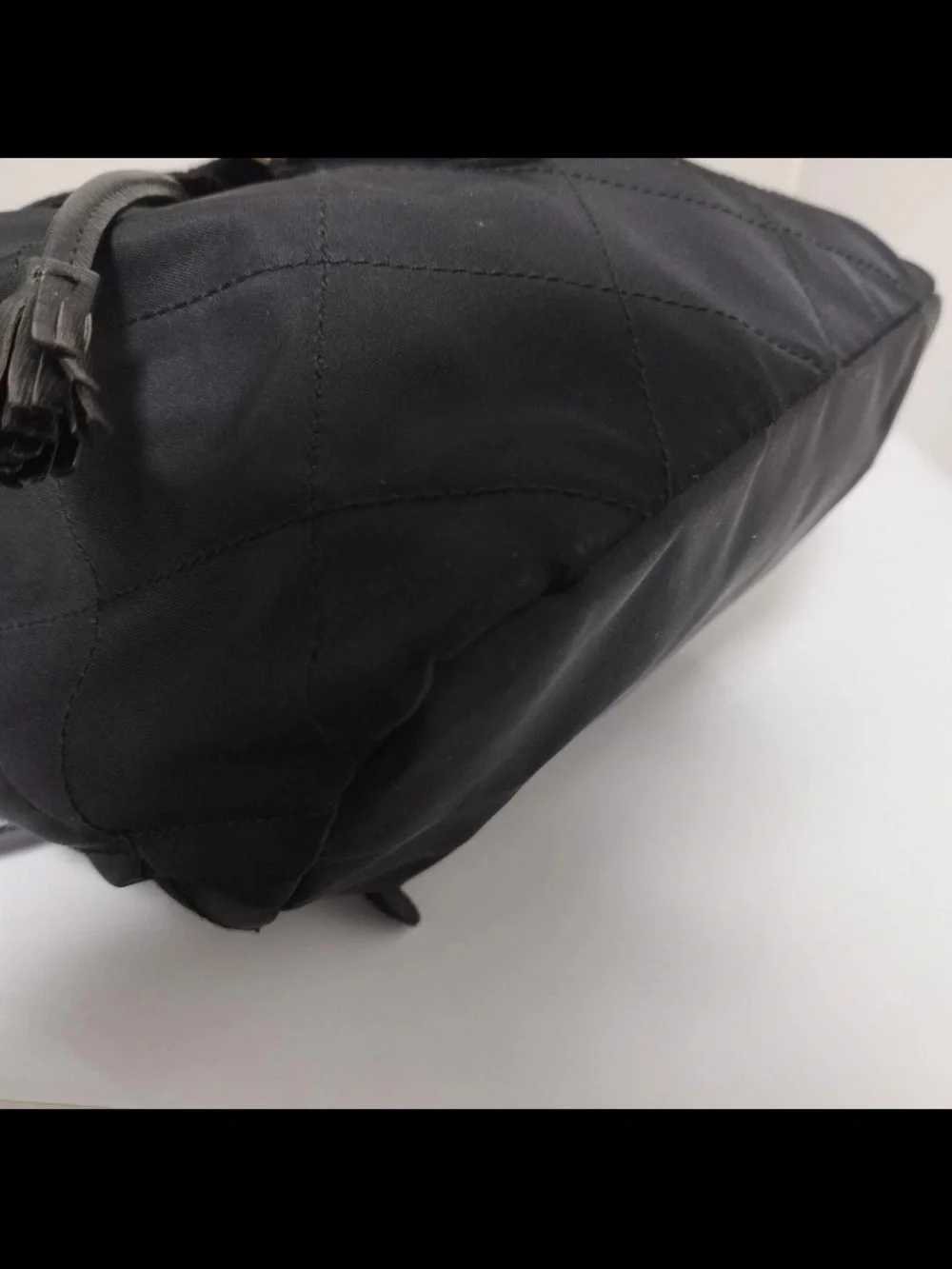 Prada Black Quilted Nylon Drawstring Backpack with Gold Hardware